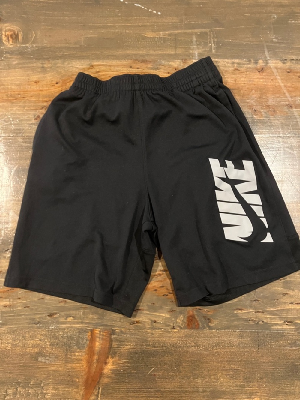 Nike Black Shorts with Large White Nike Wordmark